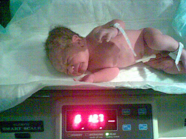 Jayden Being Weighed in at 6 pounds 12.7 ounces Jayden Being Weighed in at 6 pounds 12.7 ounces
